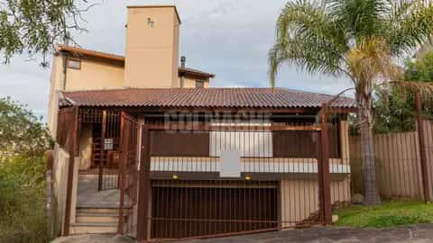 Casa · 4 dormitórios no Três Figueiras — miniatura 1